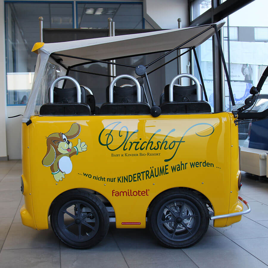 Event-Kinderwagen beschriftet mit Folienplott und Digitaldruck